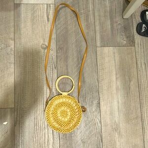 Crossbody bag with beaded detail on front, magnetic closure